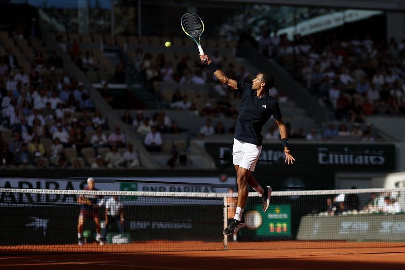 Canadian ‌world number six Auger-Aliassime eased through the opening set before ⁠Toronto-born Tabilo stepped up his game.