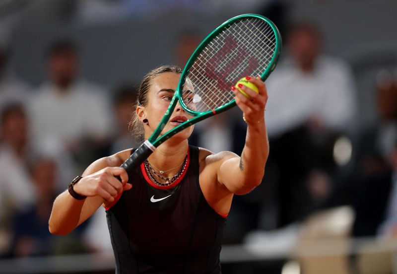 In the first women’s night-session match at Roland Garros in three years, the Belarusian world number one recovered ​from a shaky start to reach the ⁠last eight.