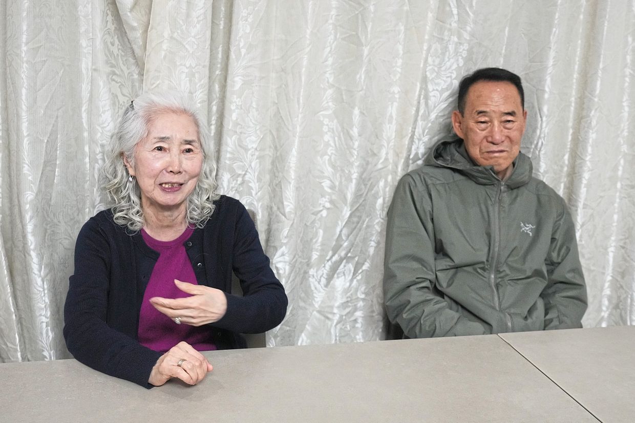 Lee's mother Poong (left) and his father, Hae Chang, cared for him daily after the stroke.