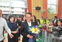 Conglomerate founder makes memorable visit to ancestral village 
