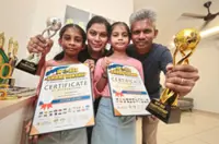 Sisters clinch silver medals at international speech competition
