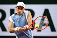 Tennis-No Sinner, no problem as marathon man Arnaldi makes it three Italian men in Paris last eight