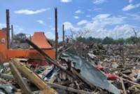 Rescuers dig for bodies after a mining explosives blast in Myanmar kills at least 43