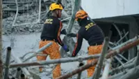 Death toll in under-construction building collapse in Philippines climbs to 20