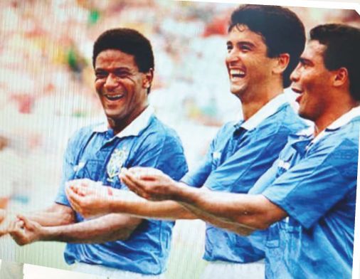 Rock-a-bye Bebeto: Brazilian strikers Mazinho, Bebeto and Romario celebrating after Bebeto had scored against Holland.