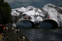 Opening of JR's installation on Paris Pont Neuf bridge delayed after damage