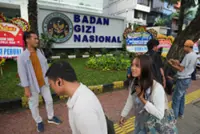 Indonesia free meals agency office locked down as investigators raid premises