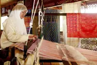 Fahmi pays tribute to national songket weaving icon Zainab Mamat
