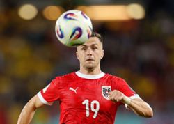 Soccer-Austria stick with World Cup squad after Baumgartner injury