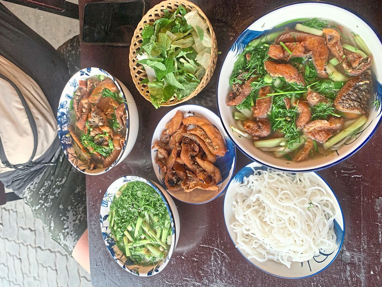 The writer and his father tried a number of local dishes in Da Nang.