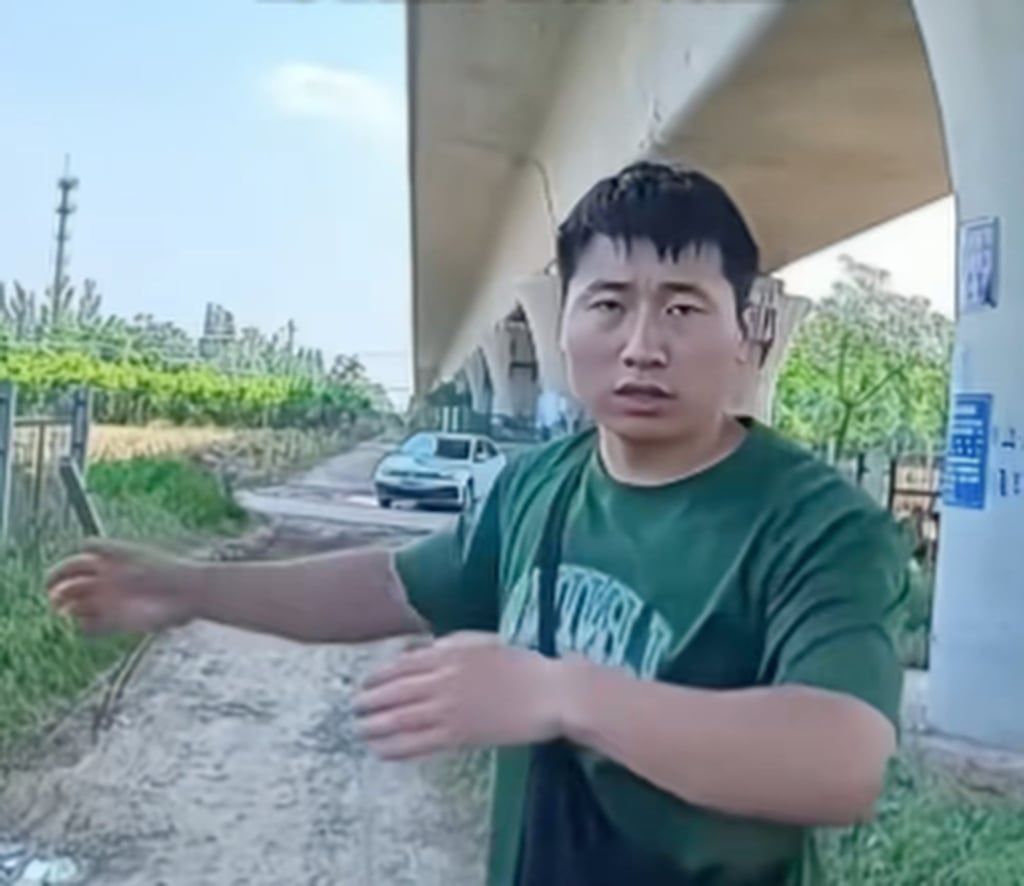 Chutou’s owner Guo, above, explains to the media what happened to his dog. - Douyin via SCMP