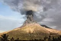 Indonesia volcano erupts, forcing airport to close