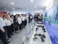 Lao leader's visit to China offers a view of the country's future