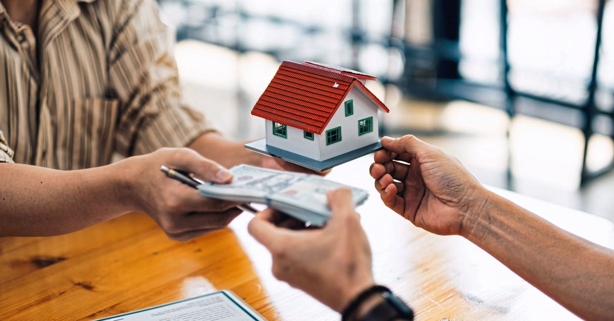 While it is mostly unspoken, many developers request a booking fee which can range from a few hundred to a few thousand ringgit.