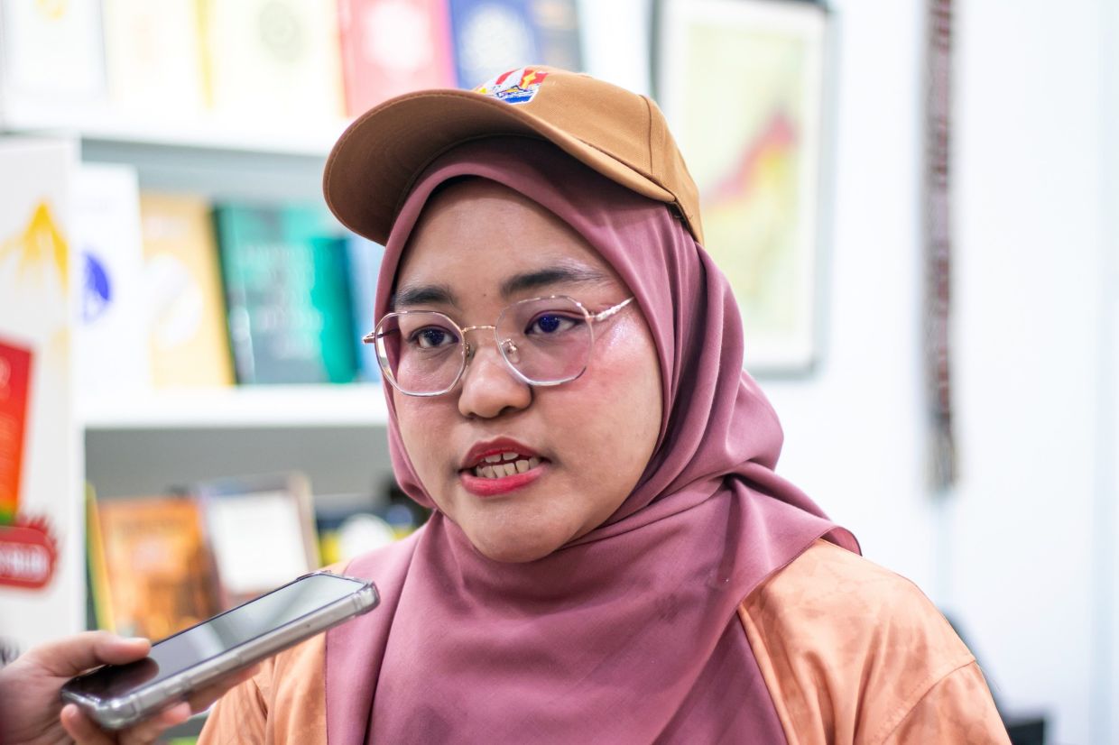 Siti Nur Aishah, the lead volunteer, said the most rewarding aspect of the role is the appreciation received from visitors, noting that a simple thank you often becomes a cherished memory. Photo: Bernama 