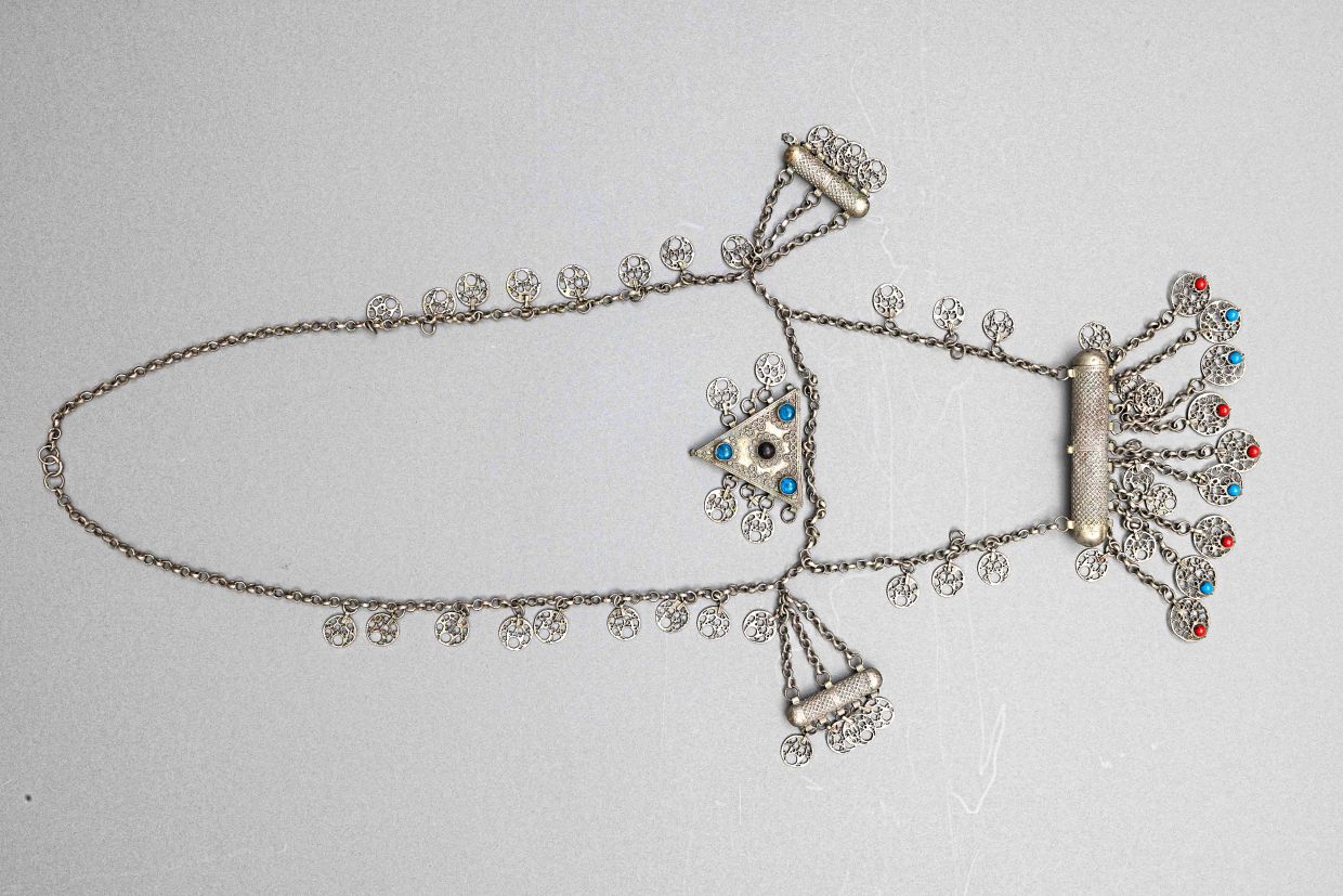 A necklace featuring an evil eye protection motif, from Jaffa or Ramlah-Lydda, dated to the 1920s. Photo: IAMM
