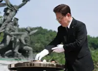 South Korean President Lee says paying full respects to those killed in service an important 'social duty'