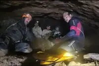 Rescuers halt search for two last men lost in Laos cave