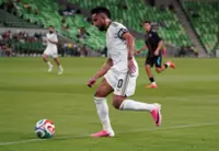 Soccer-Saudi Arabia beat Puerto Rico 3-0 after weather delay in first win under Donis