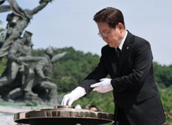 South Korean President Lee says paying full respects to those killed in service an important 'social duty'