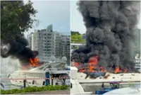 Luxury yacht at Singapore's Sentosa Cove marina catches fire; no reported injuries