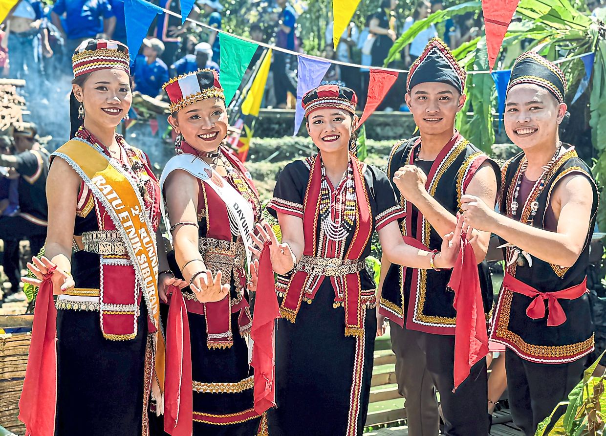 Bidayuh youths in traditional attire at the ‘Pesta Sungai Dan Rami Gawai’.