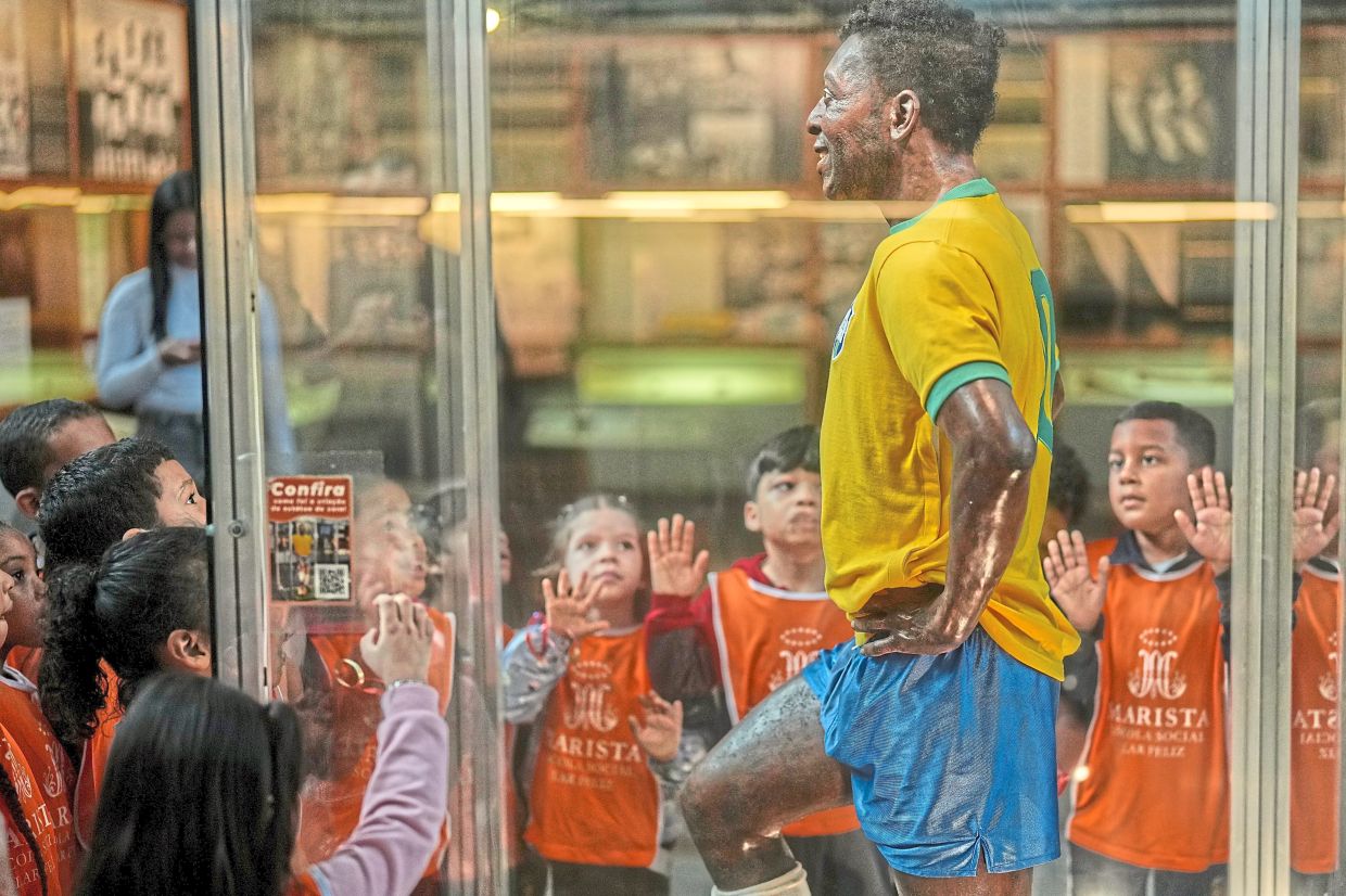 A group of children visit the Pele Museum in Santos, Brazil. Photo: AP