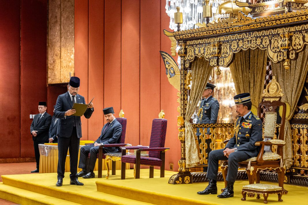 His Majesty listens as His Royal Highness Prince Al-Muhtadee Billah swears in. - Photo: Borneo Bulletin/ANN