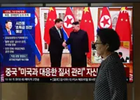 China's Xi lands in North Korea for rare visit