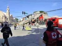 Twelve reported dead, buildings destroyed in 7.8 magnitude quake in Philippines