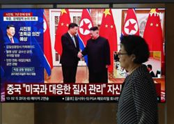 China's Xi lands in North Korea for rare visit