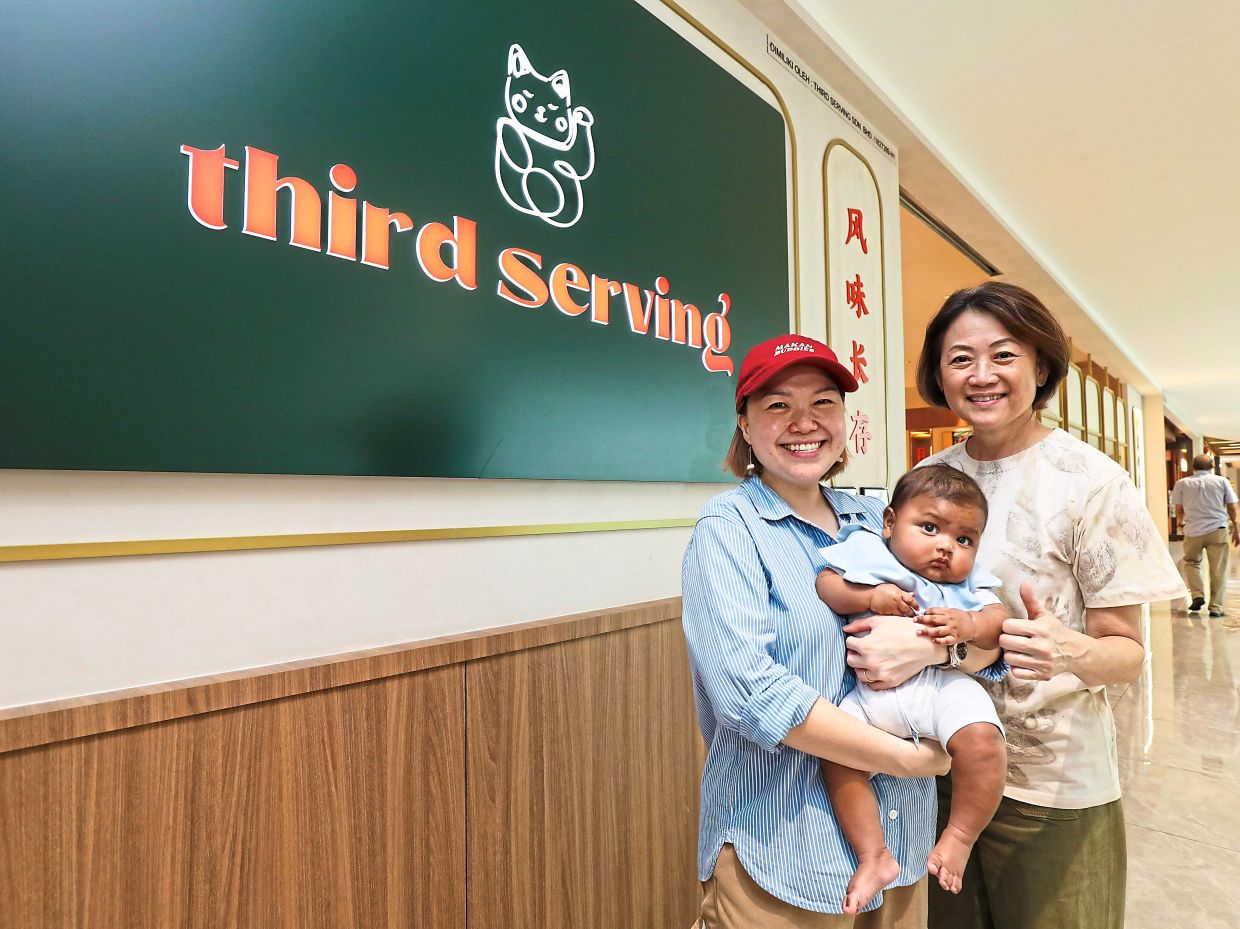 Kok (left) and Cheng (right) are the founders of Third Serving. Pictured here is Kok’s baby Ezra who is growing up at the restaurant too.