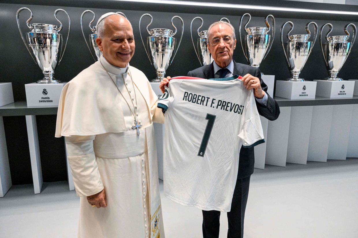 Pope Leo XIV receiving a jersey from Real Madrid's president Florentino Perez at Real Madrid's Santiago Bernabeu stadium in Madrid. Photo: Handout