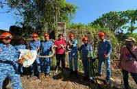 Emptied nest: Python and 14 eggs safely removed from Sandakan factory zone