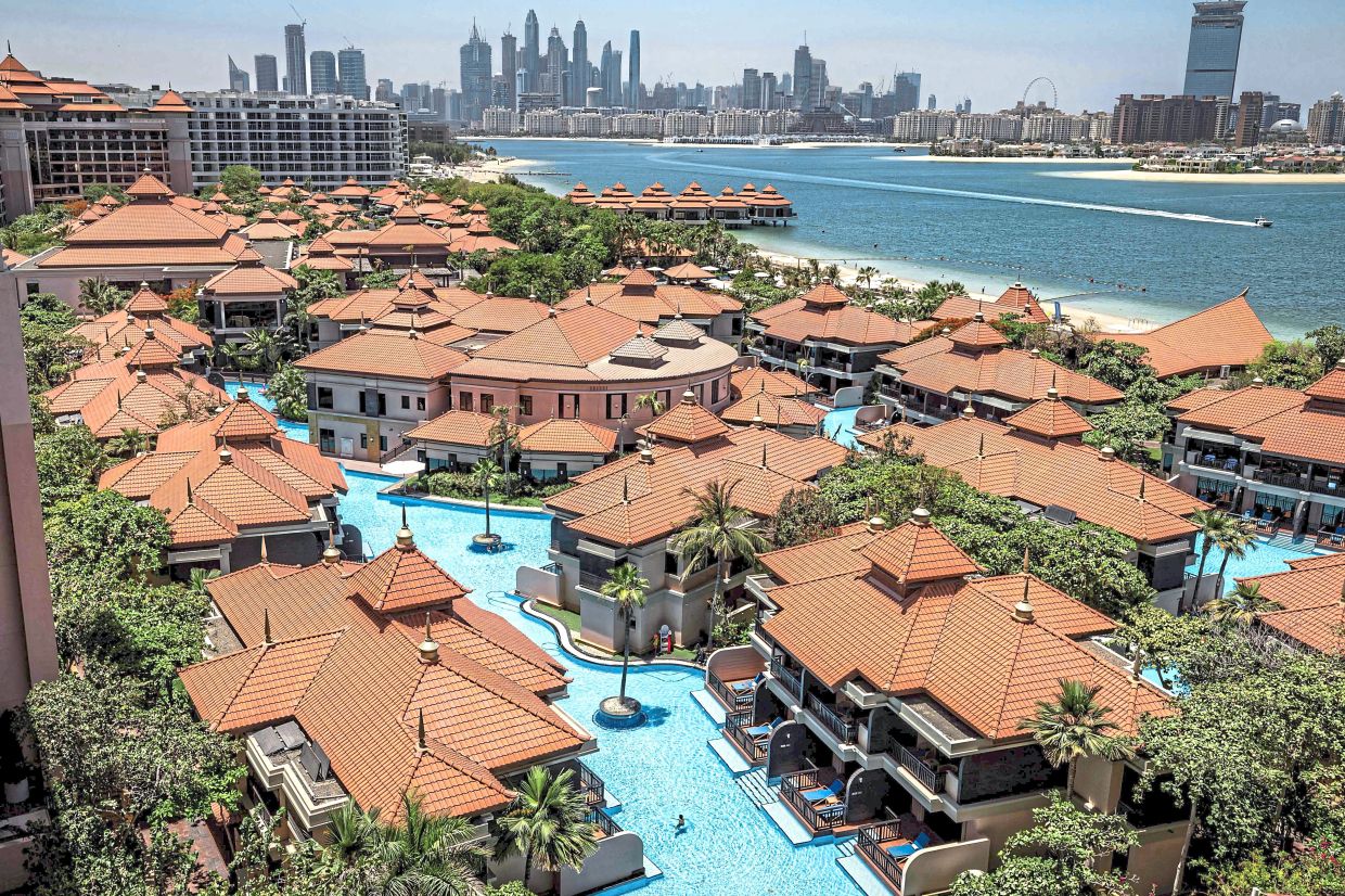 Five-star hotels and resorts like the Anantara The Palm Dubai Resort are now slashing room rates for local residents.