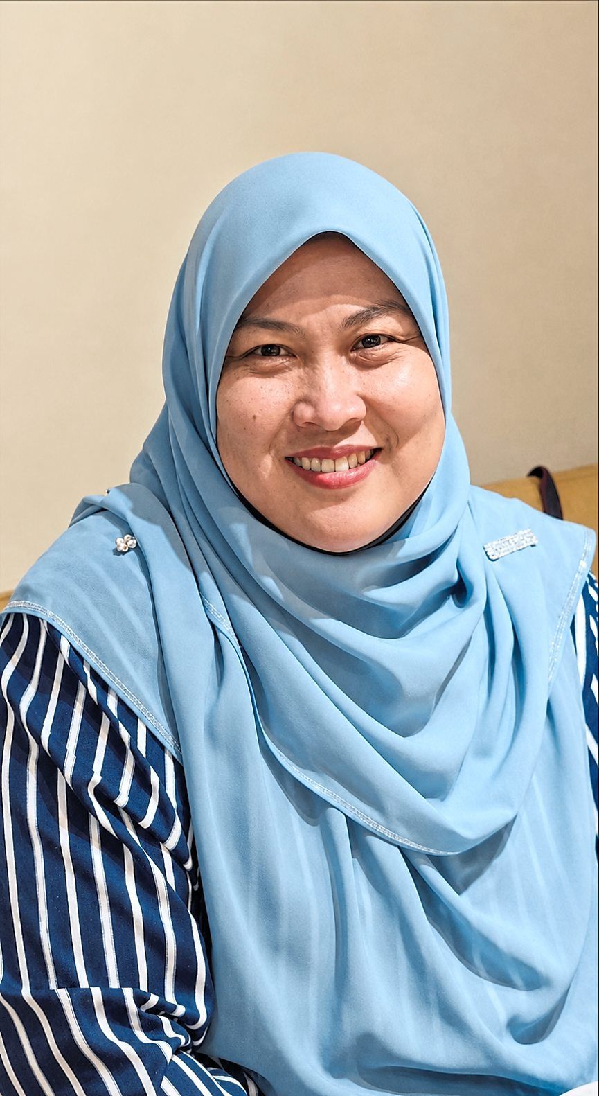 Mimi Zairol says for some families, the cost of purchasing sanitary pads an additional burden.