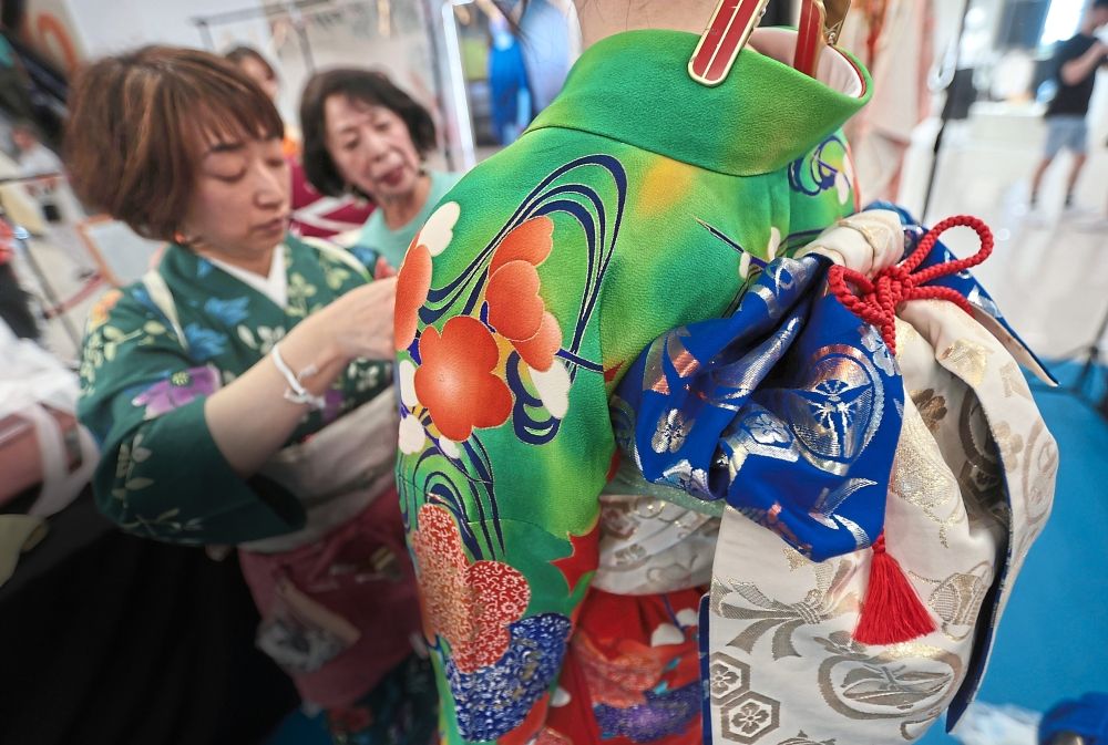 Timeless elegance: Miss Yosakoi Penang 2026 finalists getting final adjustments to their kimonos for the pageant at Gurney Plaza, Penang. The winners will lead the Yosakoi Parade during the festival at the Esplanade. — ZHAFARAN NASIB/The Star
