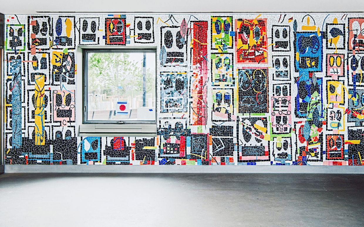Rashid Johnson's large-scale mosaic, drawing on his 'Broken Men' series, in the teaching kitchen at the Obama Presidential Center. Photo: Kevin Serna/The New York Times