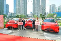 Bank surprises customers with EV lucky draw prize