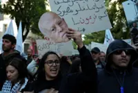 Tunisian court sentences prominent journalist Boukrim in absentia to four years