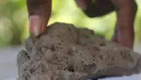 Pumice clogs island shores after Papua New Guinea eruption, stoking fears of food shortage