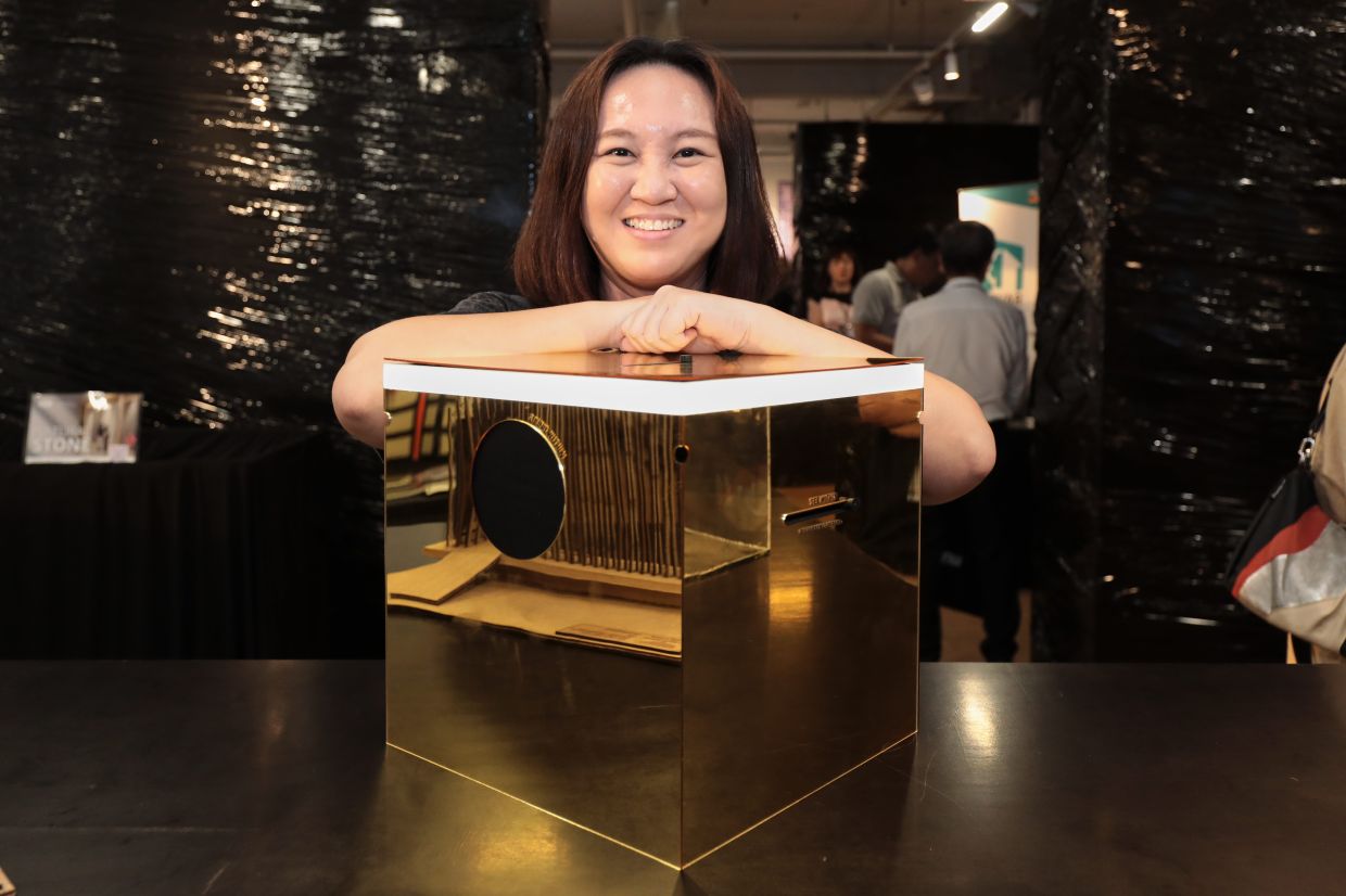 Wong with her 'Ambient Element' exhibit which focuses on sensory architecture and encourages visitors to slow down and pay attention to their surroundings.