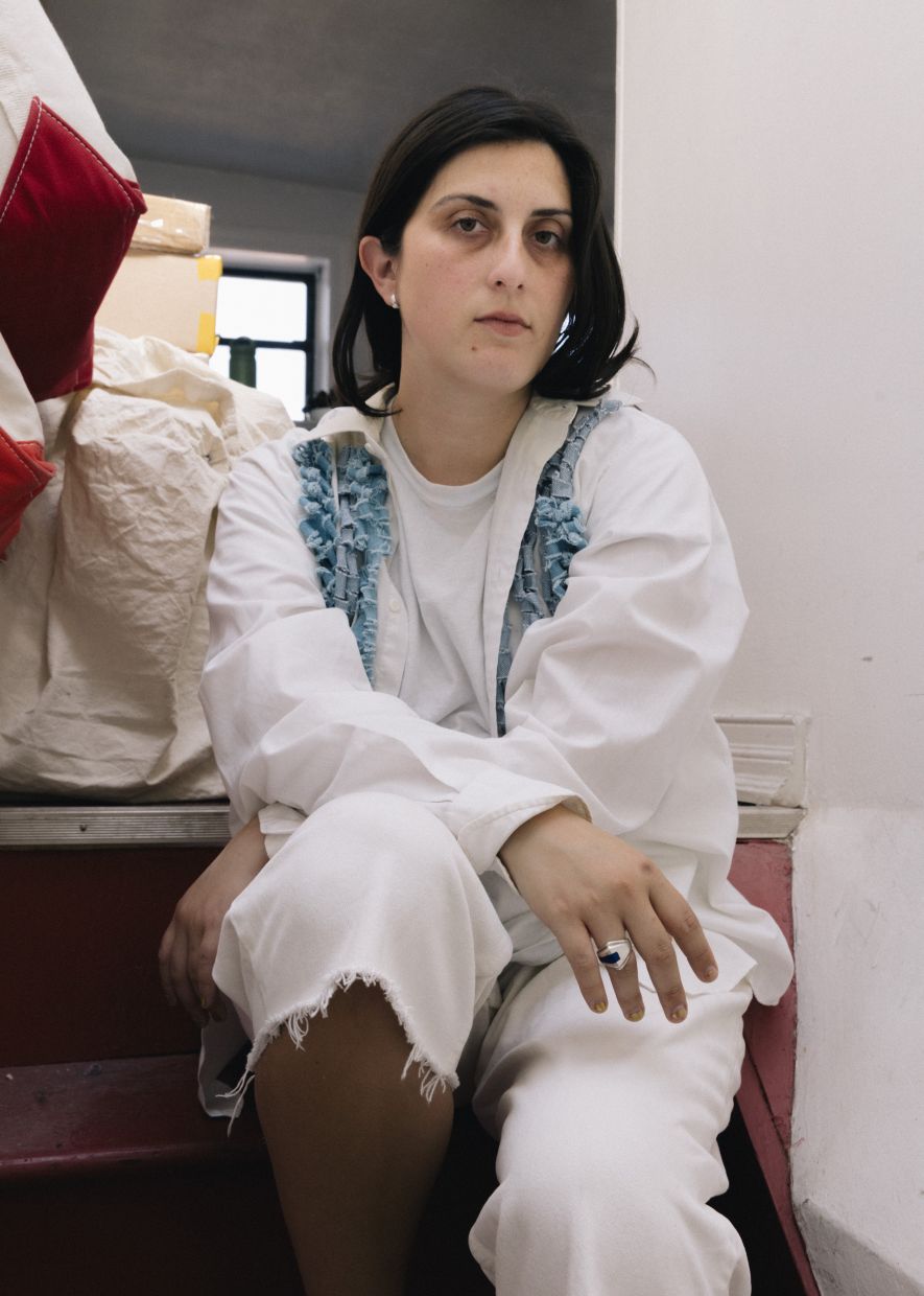 Giovanna Flores in her apartment, which doubles as her home studio, in New York. Photo: The New York Times)