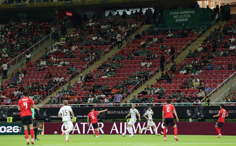 Soccer-Empty seats at World Cup match renews concerns over ticket prices