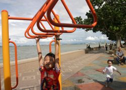 Can hanging from a bar help my child grow taller?