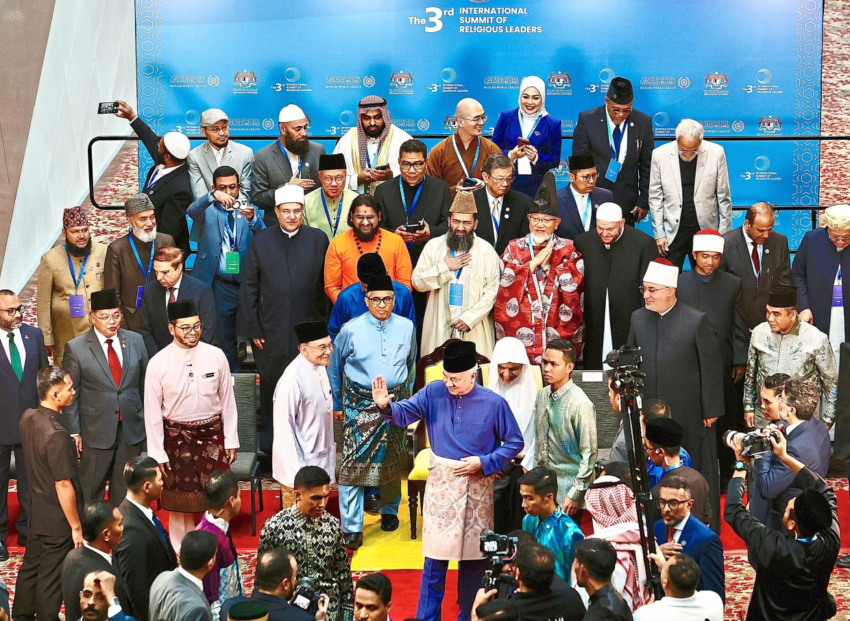 Royal presence: Sultan Nazrin attending the 3rd International Summit of Religious Leaders in Kuala Lumpur. Also in attendance is Anwar. — FAIHAN GHANI/The Star