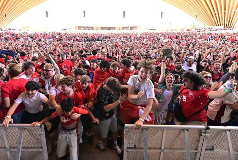 Soccer-World Cup reaching fever pitch in Vancouver after Canada draw opener