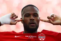 Soccer-Larin the man as courageous Canada battle to 1-1 draw with Bosnia