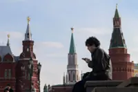 Two phones and an app: How Russians skirt Putin's digital iron curtain