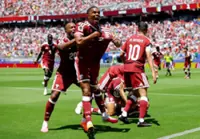 Soccer-Qatar hail first World Cup point after late goal stuns Switzerland​ in 1-1 draw ​